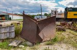 Old Snowplow laying on the yard